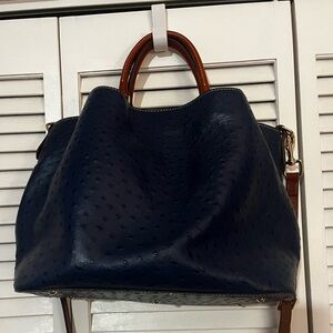 Stylish faux 4 fall. Crossbody/handle satchel. Several storage sections NWOT